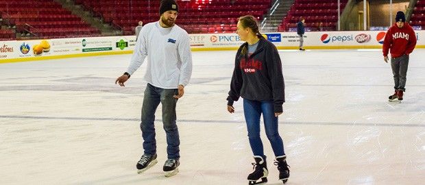 Couple Skating at Goggin Ice Center